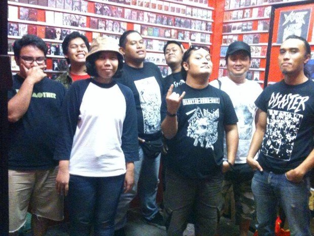 picture of the shop's interior with several friends and members of ATOMICDEATH on the shop's opening day - pix from basement record's FB page.